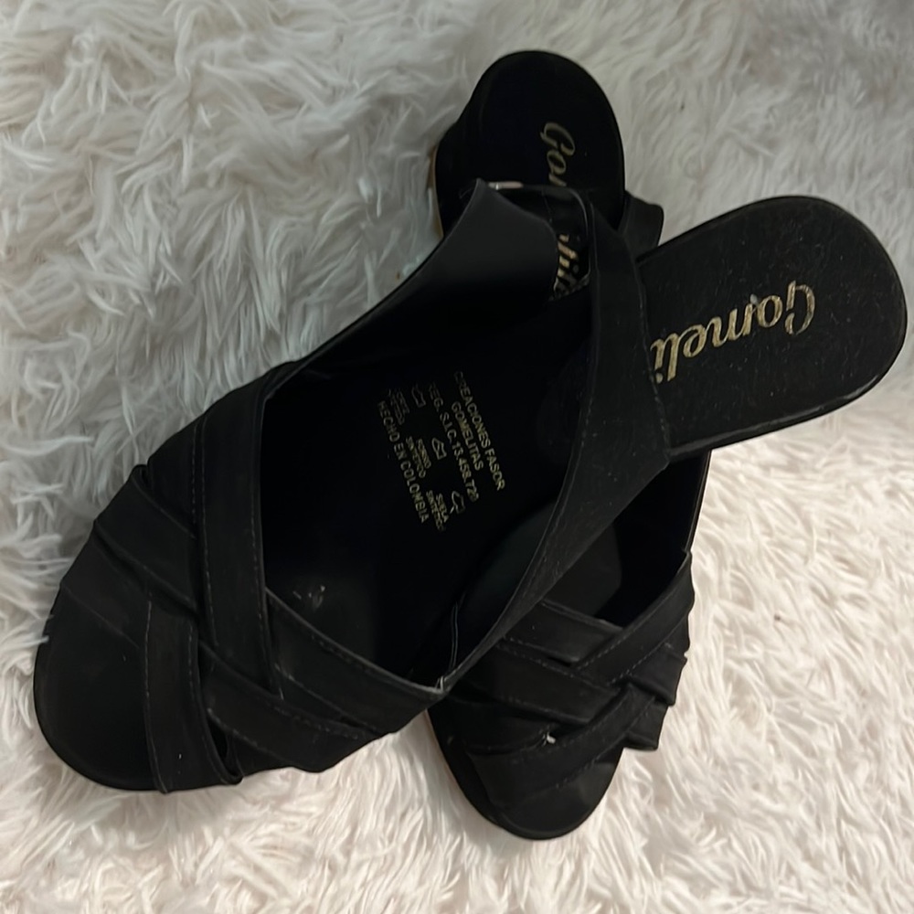 Black slightly used sandals